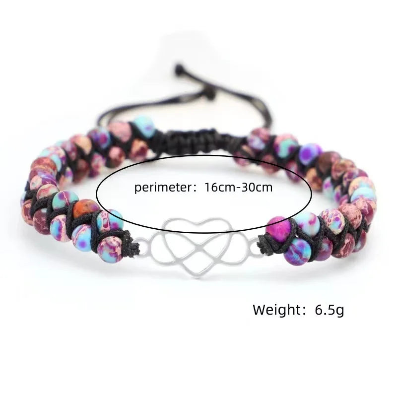 Multicolored beaded bracelet with black cord, showing measurements on a white background.