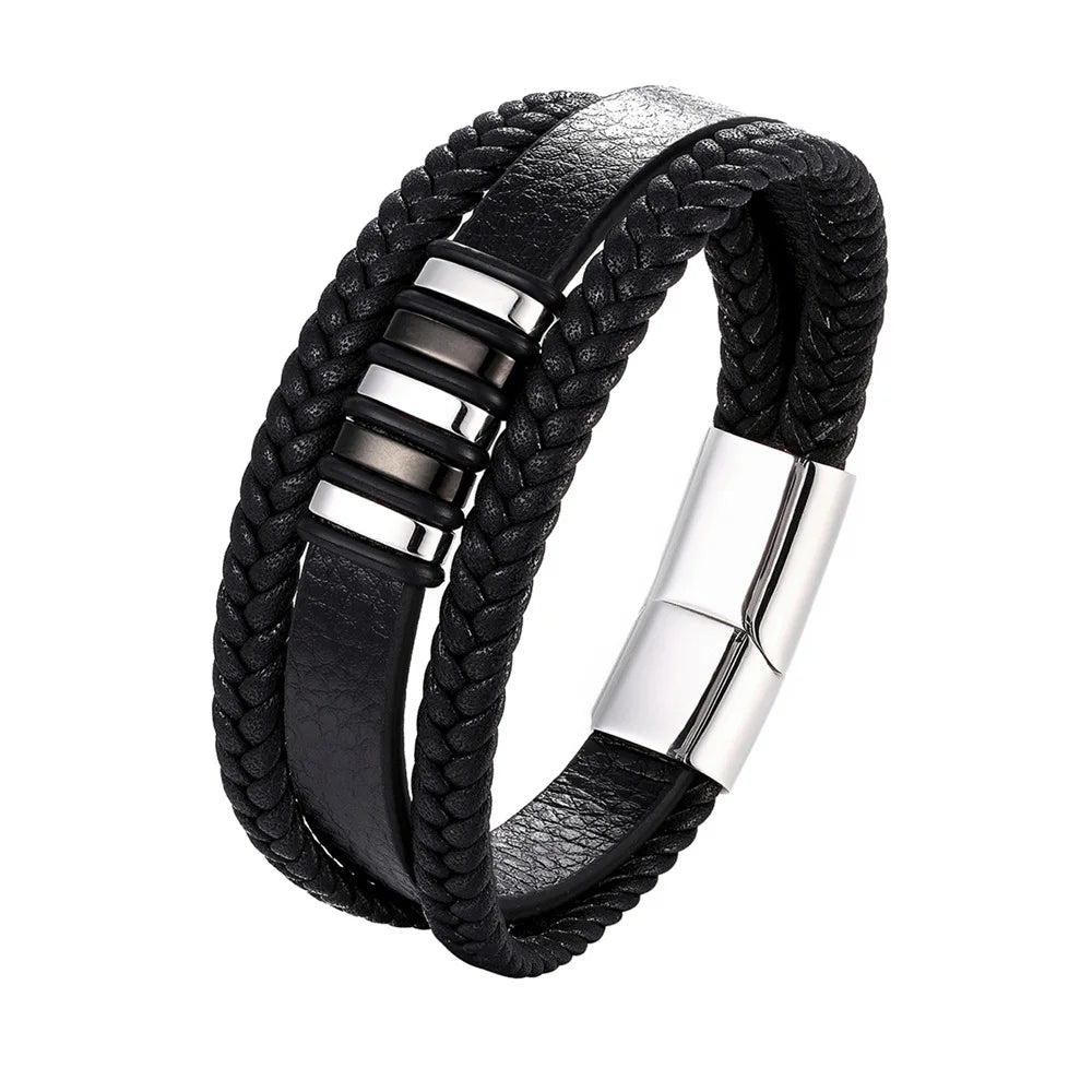 Black braided leather bracelet with silver metal accents on a white background