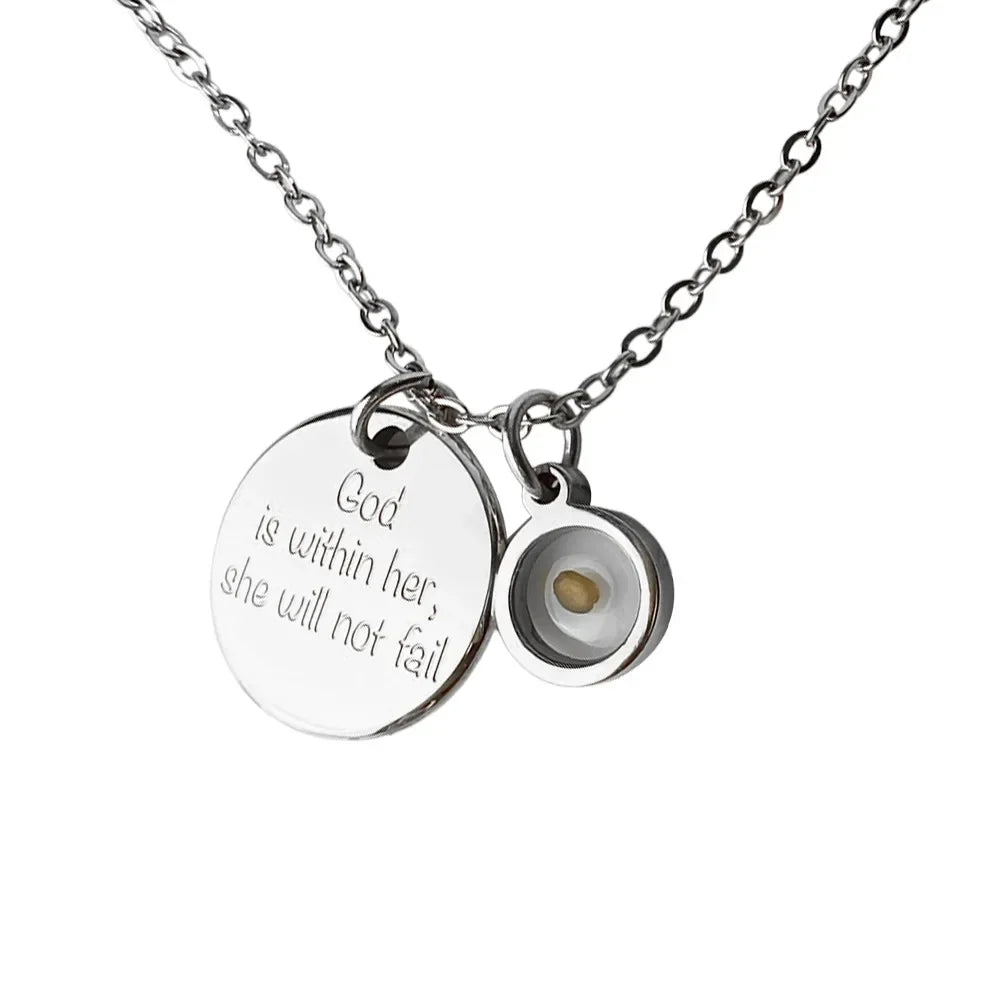 Necklace with two charms on a white background