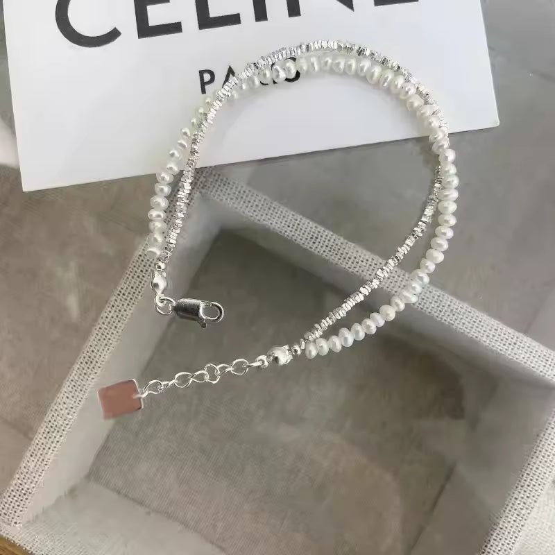 Pearl bracelet on a white card 