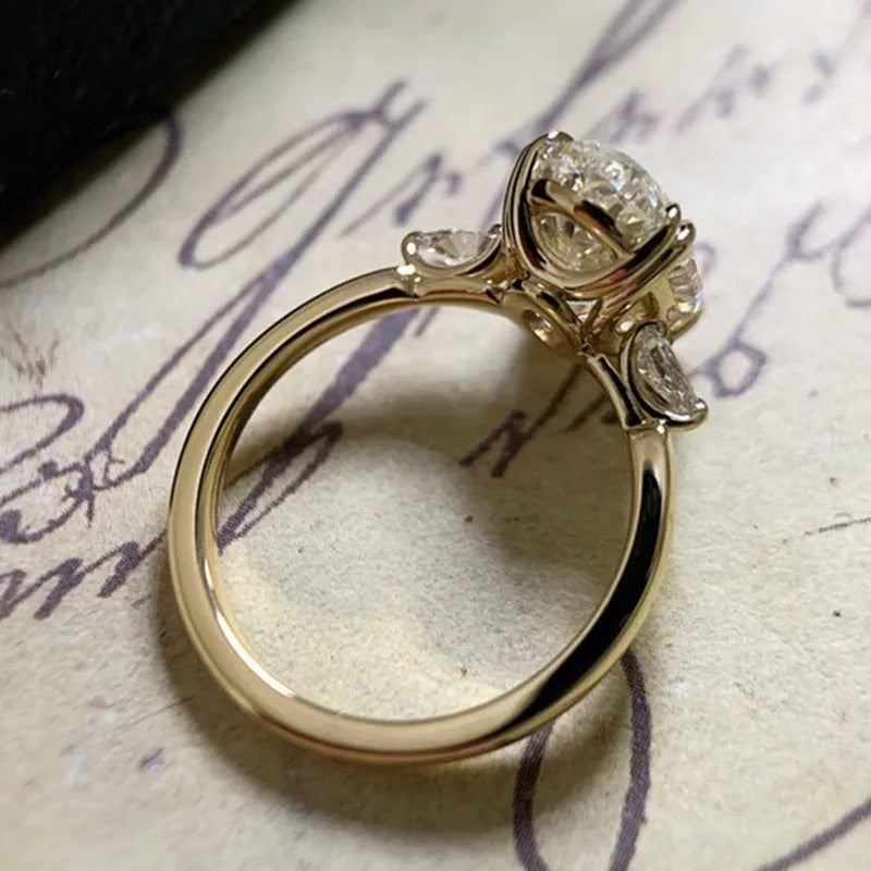 Silver ring with diamonds on a textured surface