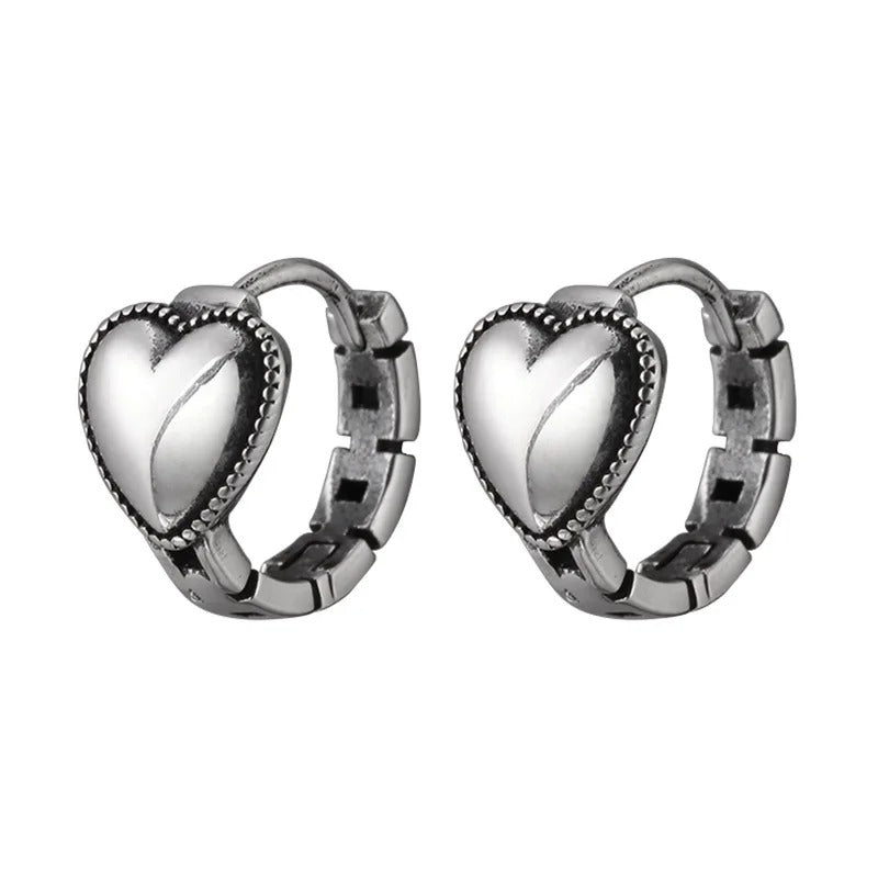 Heart-shaped earrings on a white background