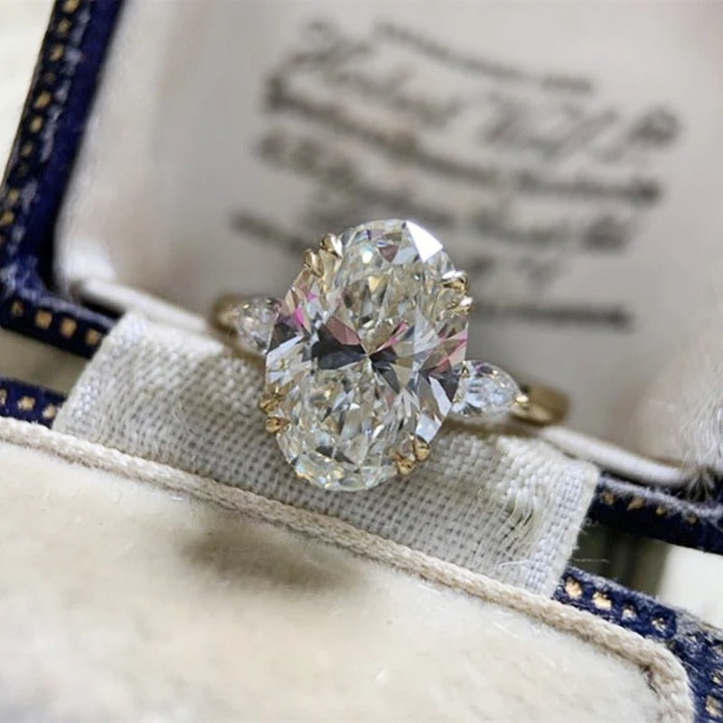 Diamond ring on a textured surface with a blurred background