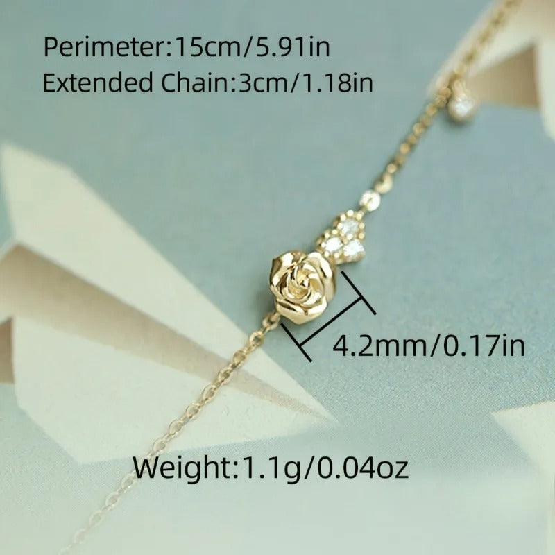 adjustable rose charm bracelet showing length and extender chain