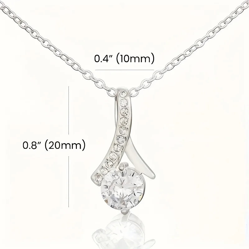 Silver pendant necklace with measurements on a white background
