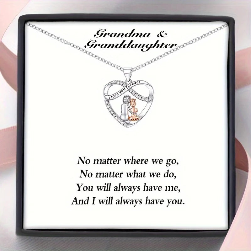 Heart-shaped necklace with 'Grandma & Granddaughter' message on a card