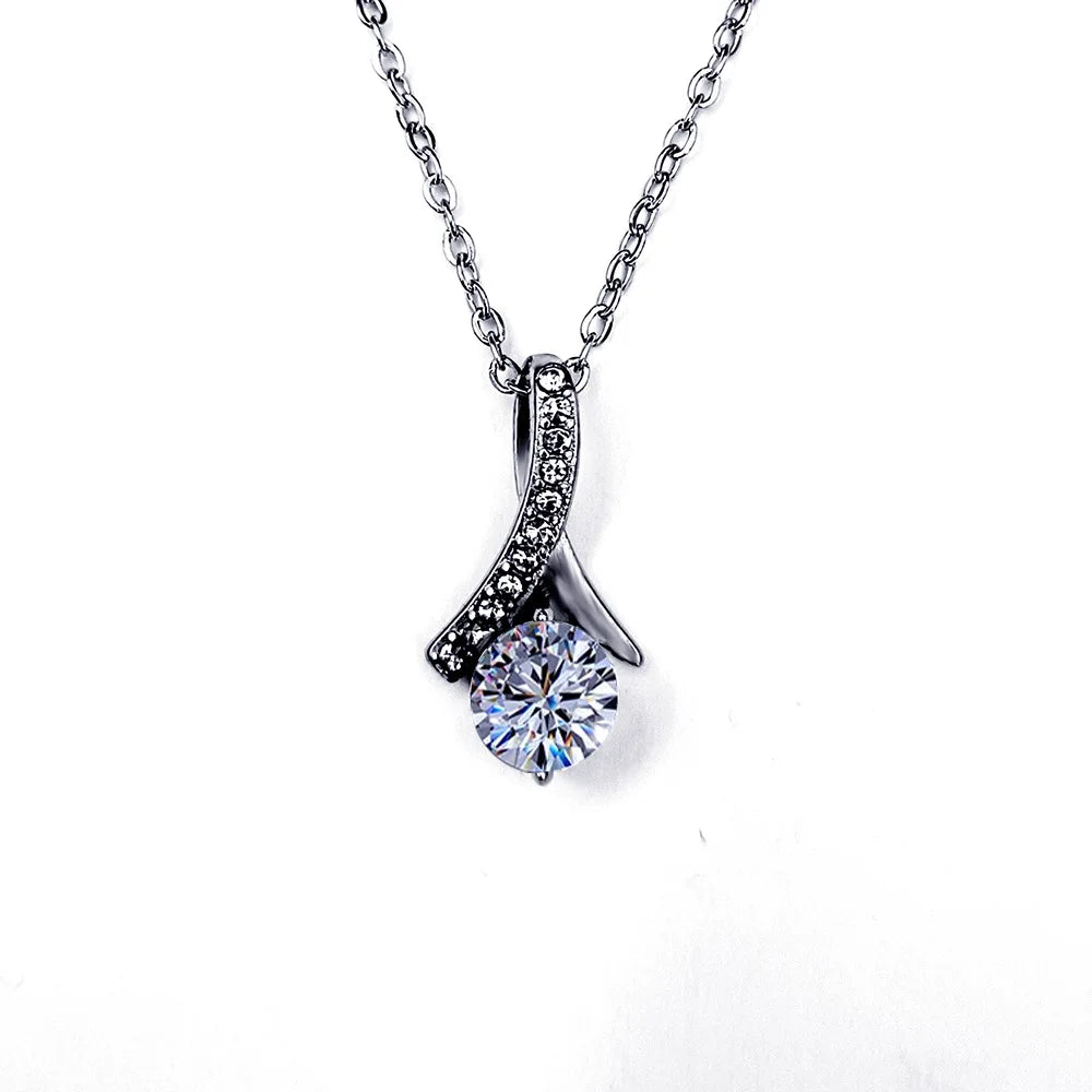 Silver necklace with a diamond pendant on a white background