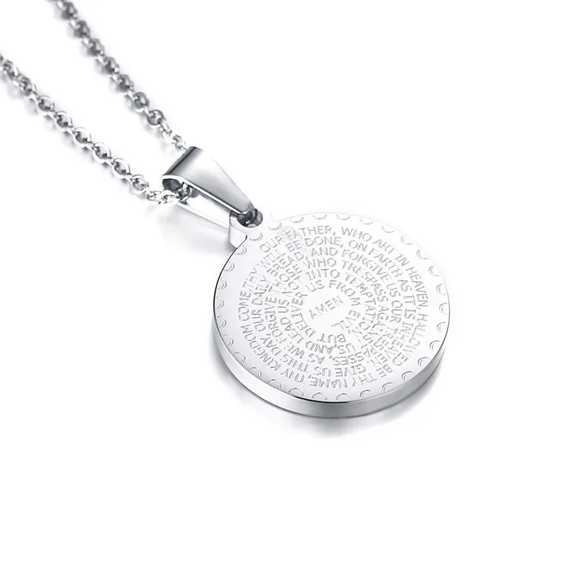 Silver necklace with a round pendant on a white background