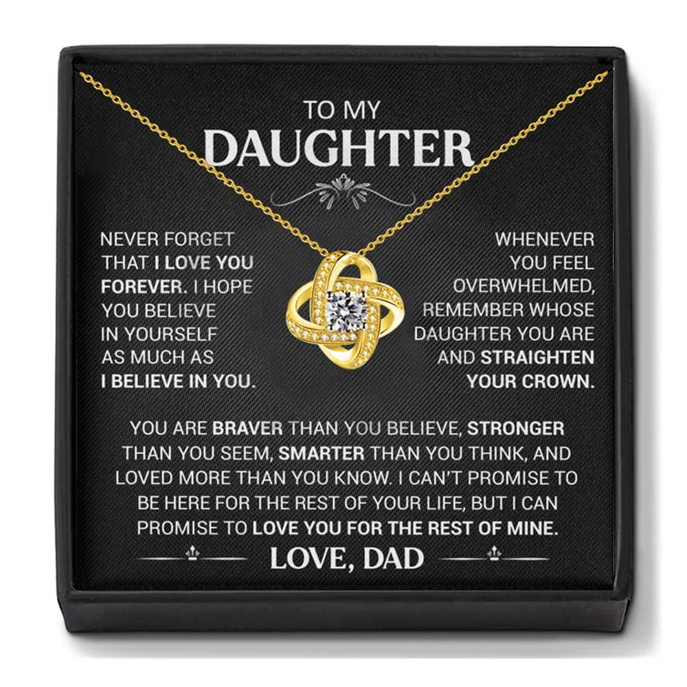 Necklace with a message to daughter from dad on a black box
