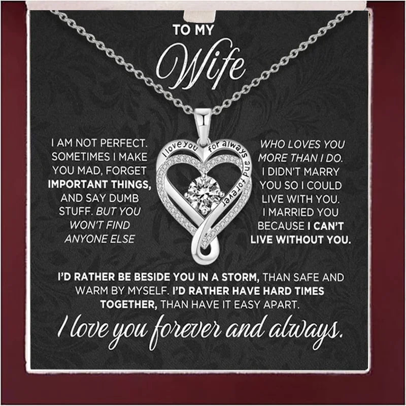 Necklace with heart-shaped pendant on a card for a wife, featuring an emotional message.