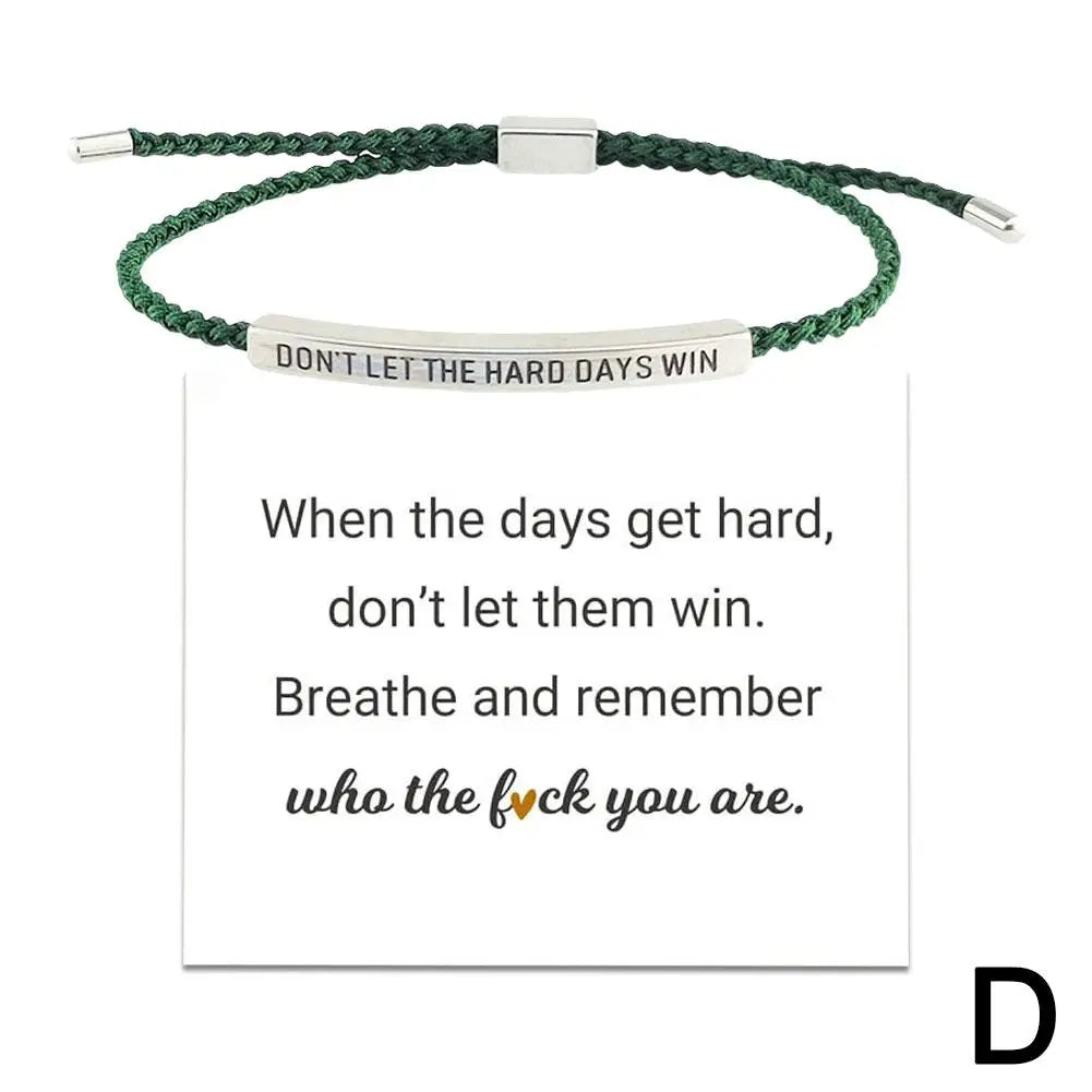 Green braided bracelet with motivational message on a white background