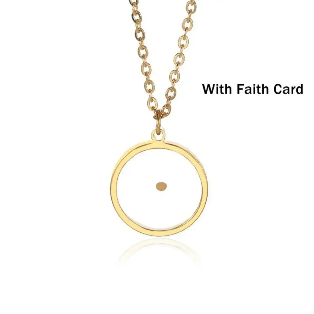 A gold pendant necklace featuring a minimalist open circle with a small central dot, suspended from a gold link chain. The text 'With Faith Card' is displayed on the right side, indicating an included card.