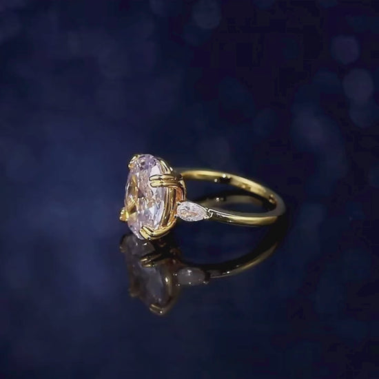 Video displaying Oval Cubic Zirconia Solitaire Ring Classic Gold-Tone Statement Design