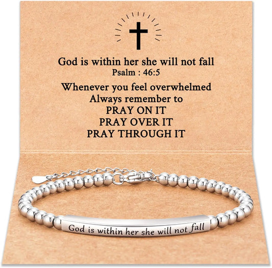 Silver bracelet with engraved message on a cardboard backing with text