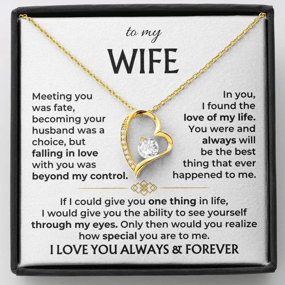 Gold heart-shaped necklace with sentimental message card for a wife
