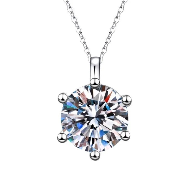 Silver necklace with a round diamond pendant on a white background