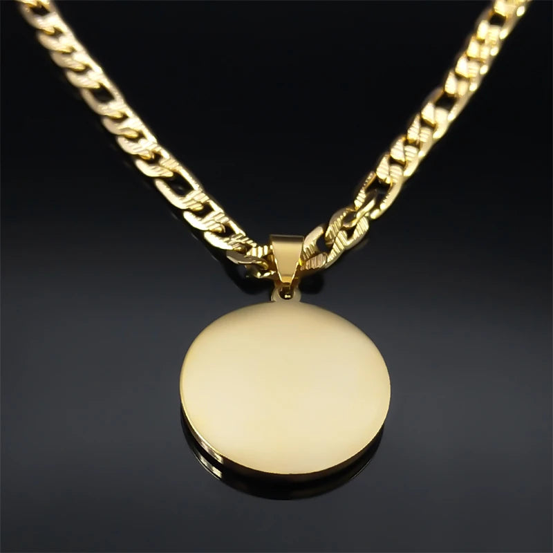 Gold necklace with a round pendant on a dark background