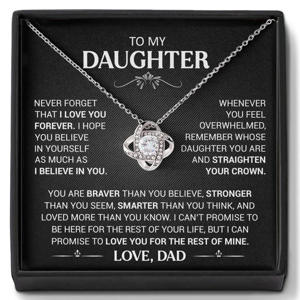 Necklace with a sentimental message card for daughter on a black background