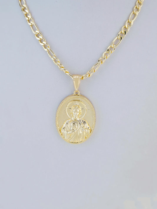 Gold necklace with a pendant on a light gray background