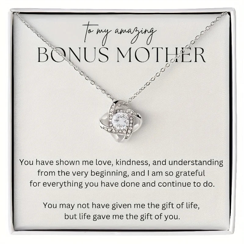 Necklace with heart-shaped pendant on a card for a bonus mother, featuring a heartfelt message.