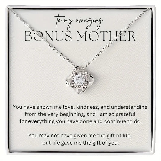 Necklace with heart-shaped pendant on a card for a bonus mother, featuring a heartfelt message.