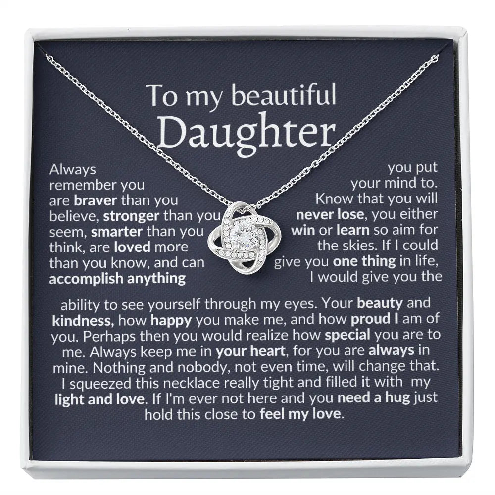 Necklace with a heart pendant in a box with a message for a daughter