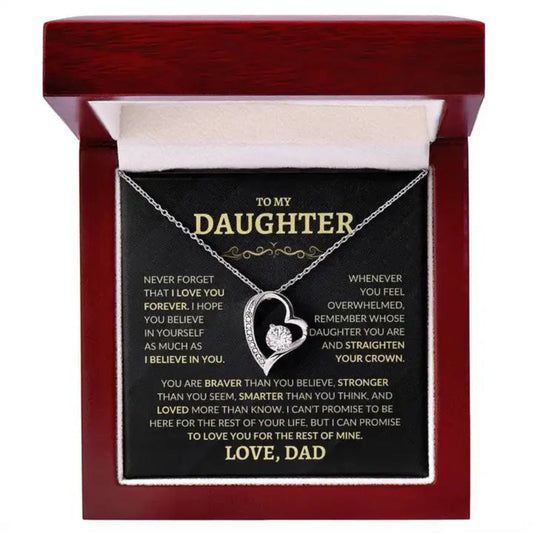 Heart-shaped necklace with a pendant in a wooden box