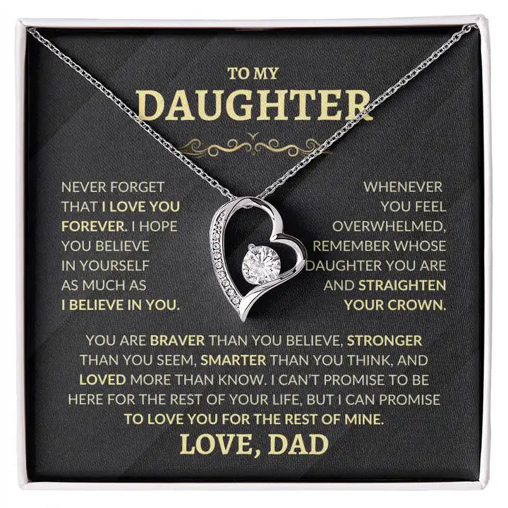 Necklace with heart-shaped pendant in a box with a message from a father to his daughter.