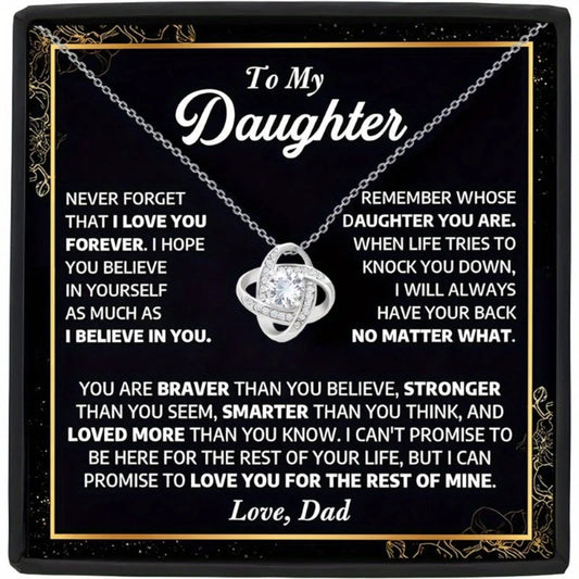Necklace with sentimental message to daughter on a black background