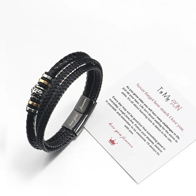 Black braided bracelet with a message card on a white background