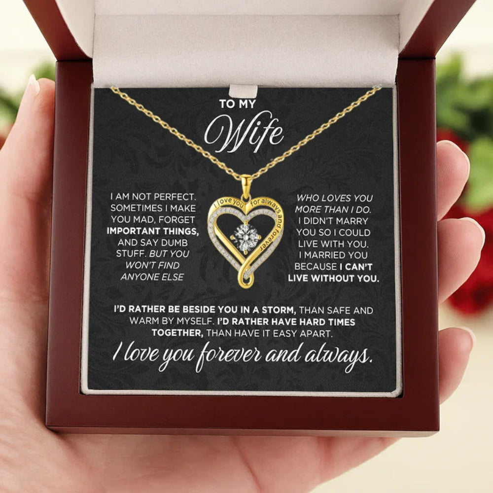 Necklace with heart pendant in a box with a sentimental message for a wife.