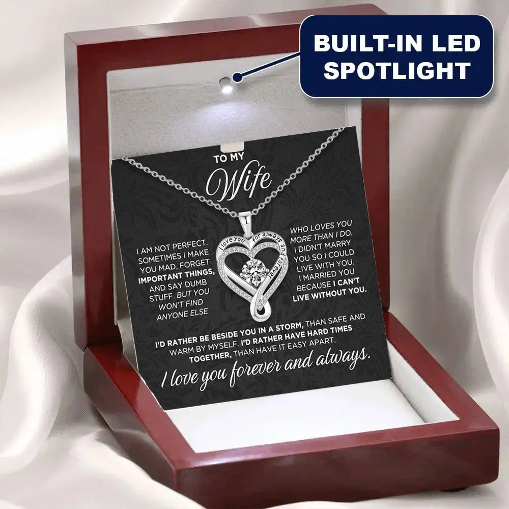 Necklace with sentimental message card on a stand with LED spotlight feature