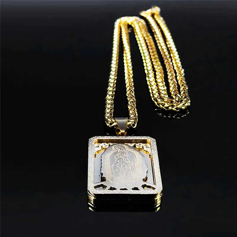 Gold necklace with a square pendant on a black background