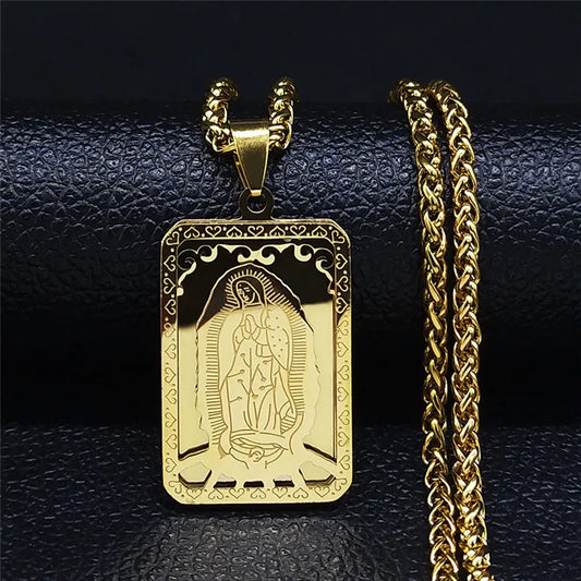 Gold pendant with chain on a black textured background