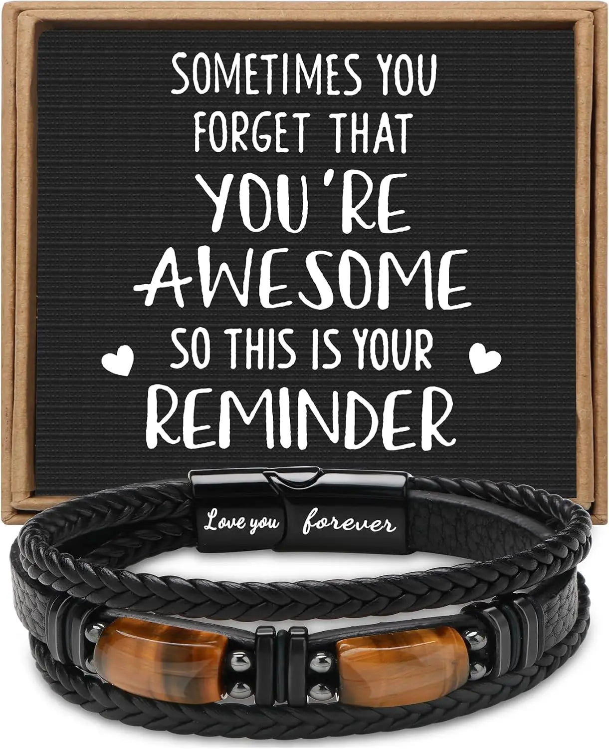 Black braided leather bracelet with wooden accents and a motivational quote on a black board background.